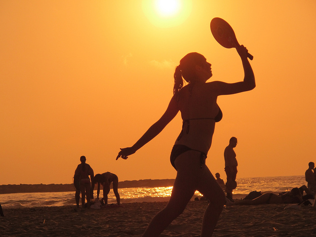 Matkot on the beach. Photo by Lina Nagano, courtesy Creative Commons