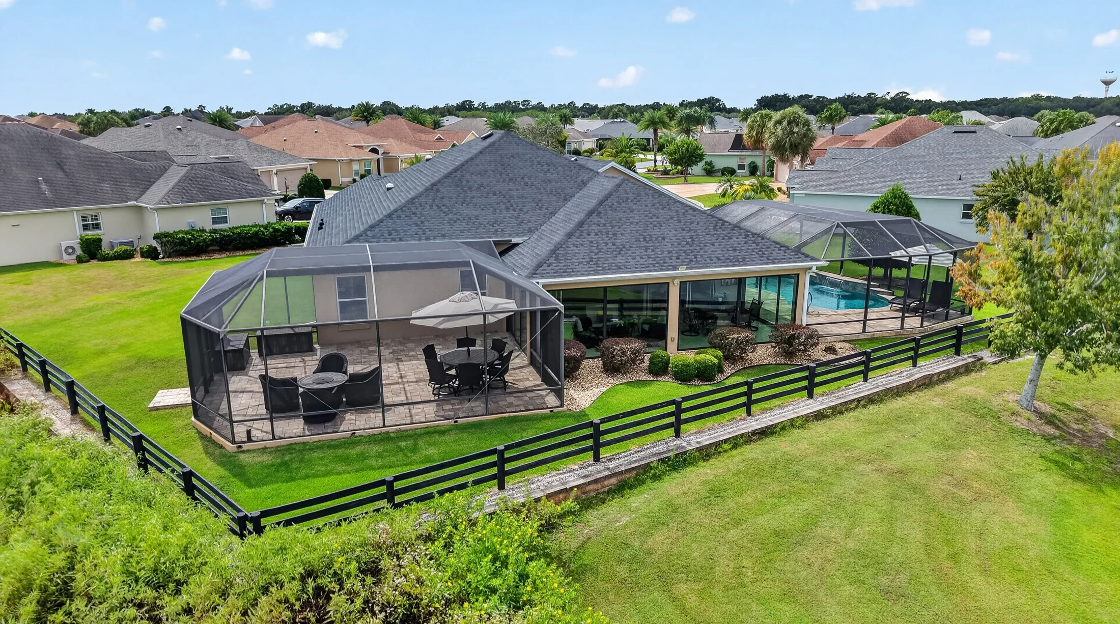 Drone view of home and pool