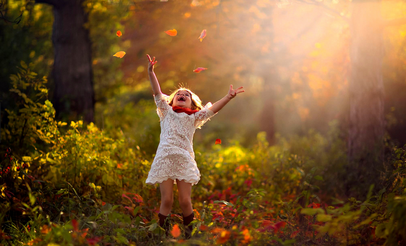 happy_girl_in_woods.jpeg