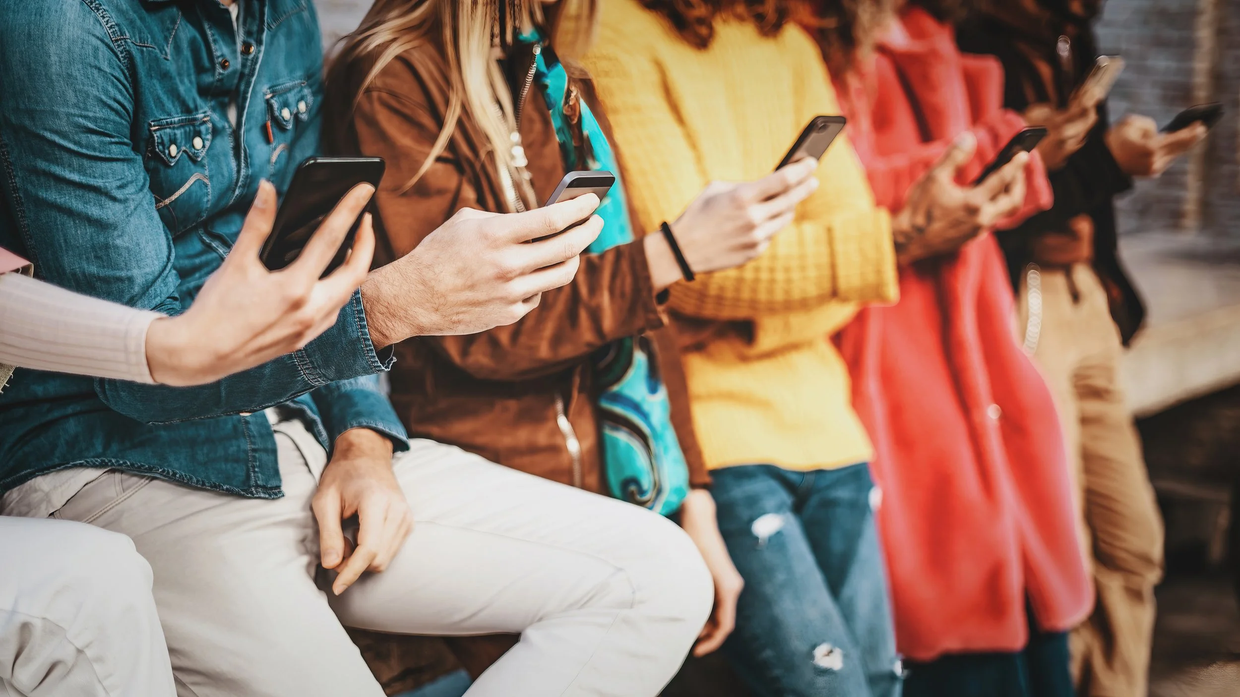friends-using-smartphone-2022-03-09-03-03-56-utc.jpg