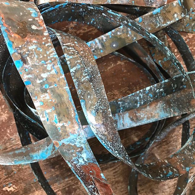 S T A R T I N G a new project with ribbons of copper ready to weave into another pendant light. #copperlight #copper #copperpatina #copperbydesign #cbdcustommade #copperlightproject