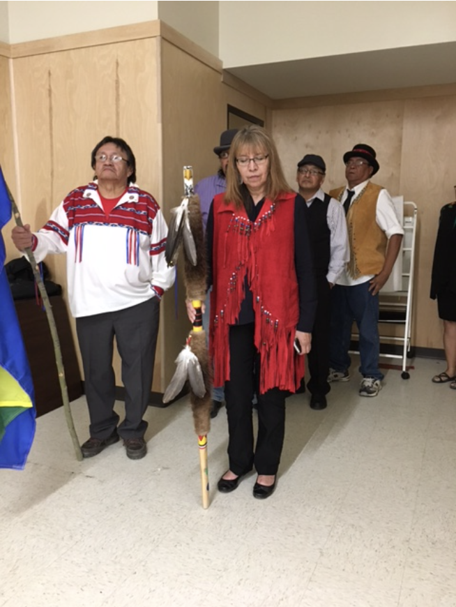 The Chief's red vest was made in KASKii as well as the moose hide one worn by the man behind her. 