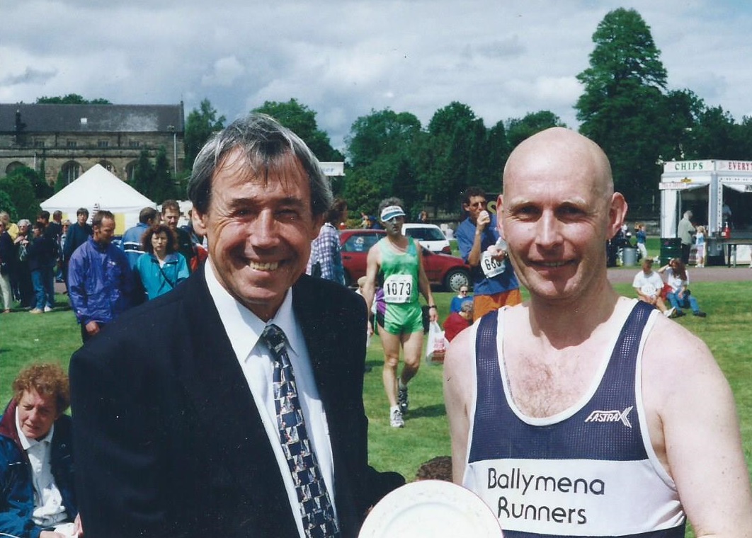 Roy being presented with the Potteries Marathon Finishers Plate by England World Cup winning 'keeper Gordon Banks