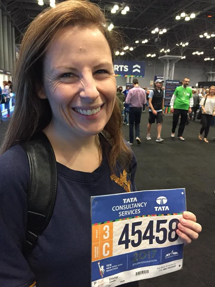 Emma Donnelly collects her New York City Marathon from the expo