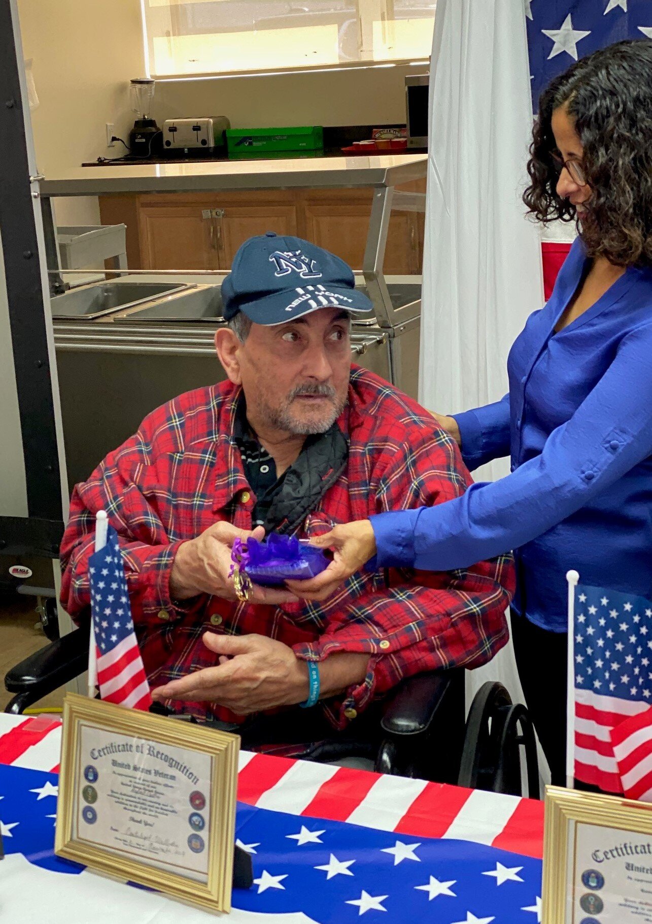 veteran receiving token of recognition