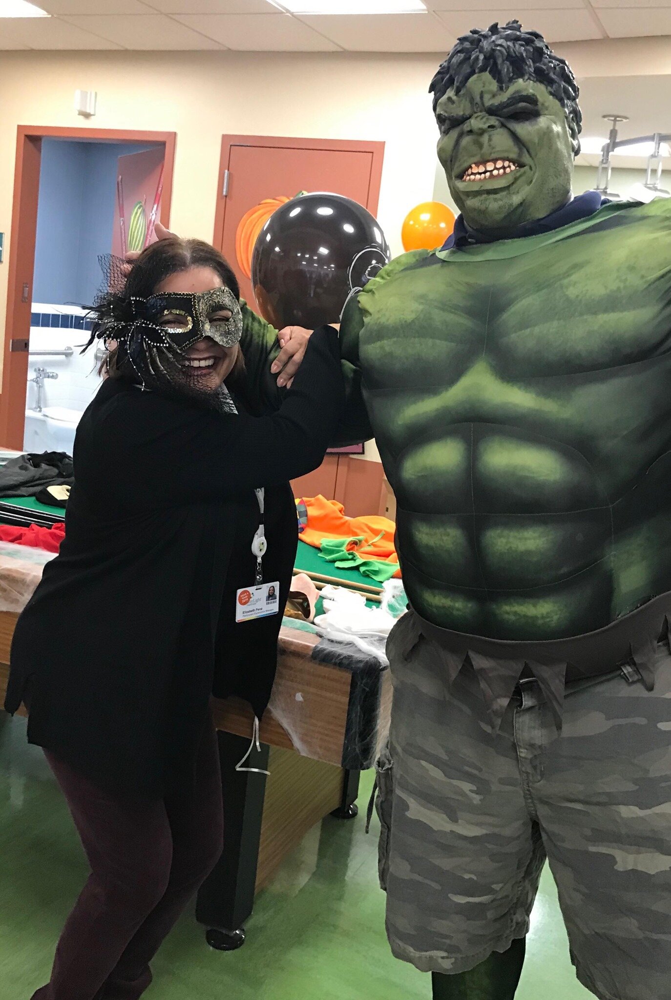 Incredible Hulk pictured with employee