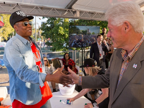 Bill Clinton and Jay-Z greeting one another at the Made in America Festival Sept. 4th.