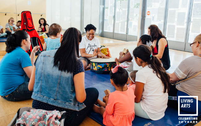 Detroit Wolf Trap Teaching Artist, Alesha Brown, leads a baby Wolf Trap class at the FREC-Mercado.