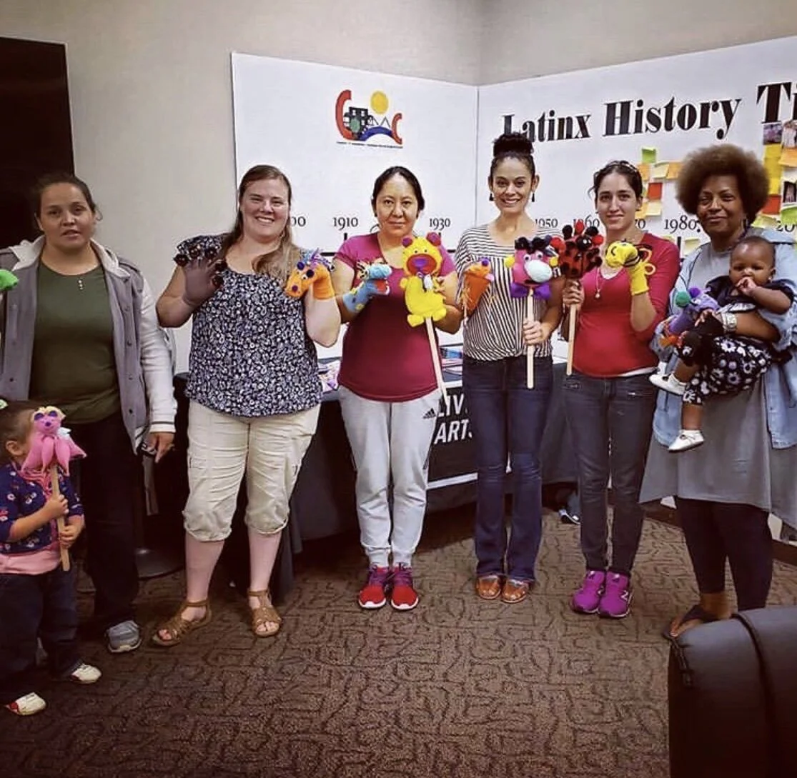 Teaching Artist Karilu Alarcon Forshee with participants in puppet workshop at Congress of Communities.
