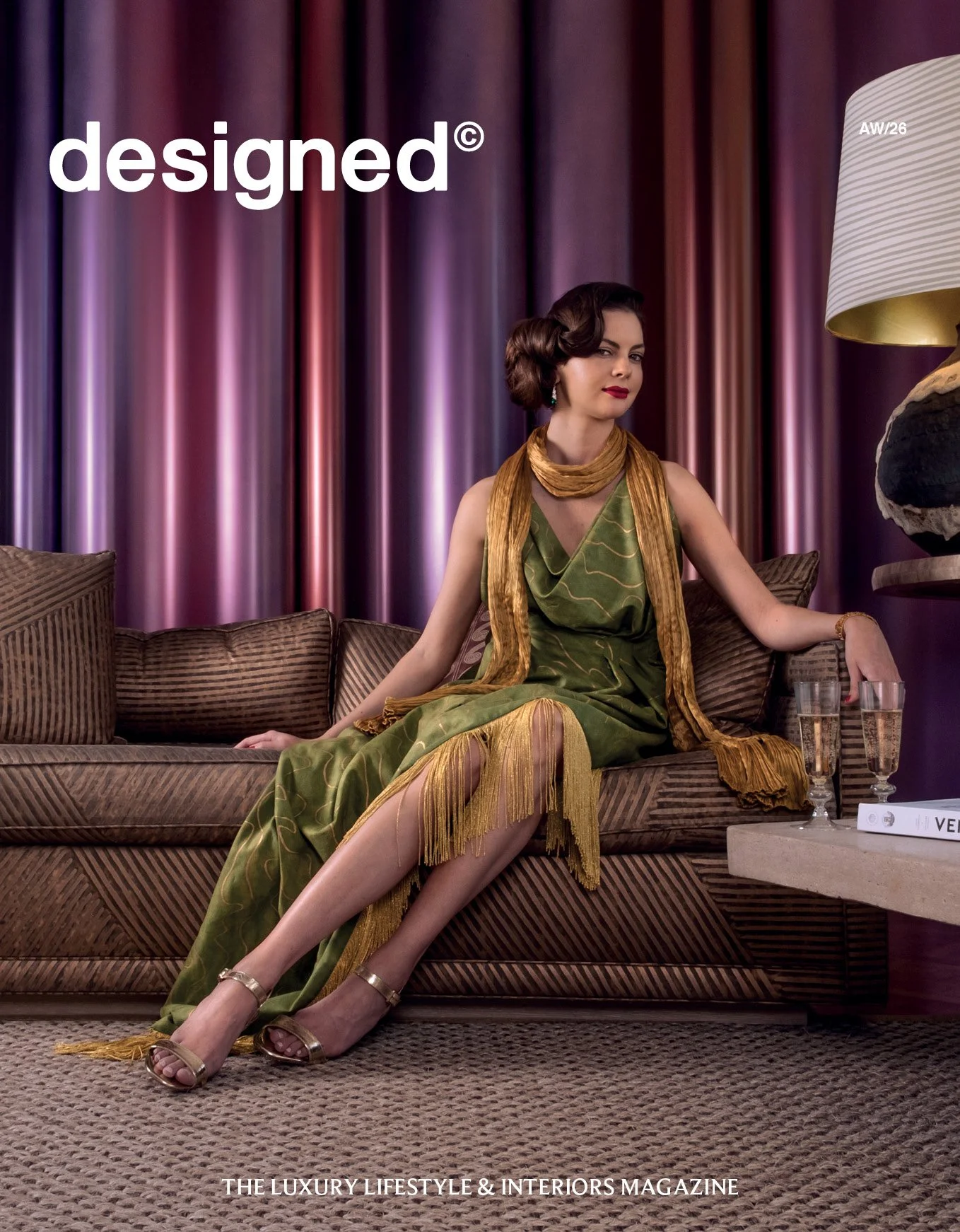 Designed Magazine cover with model in green dress on couch from Venice, Italy shoot at Fortuny villa.