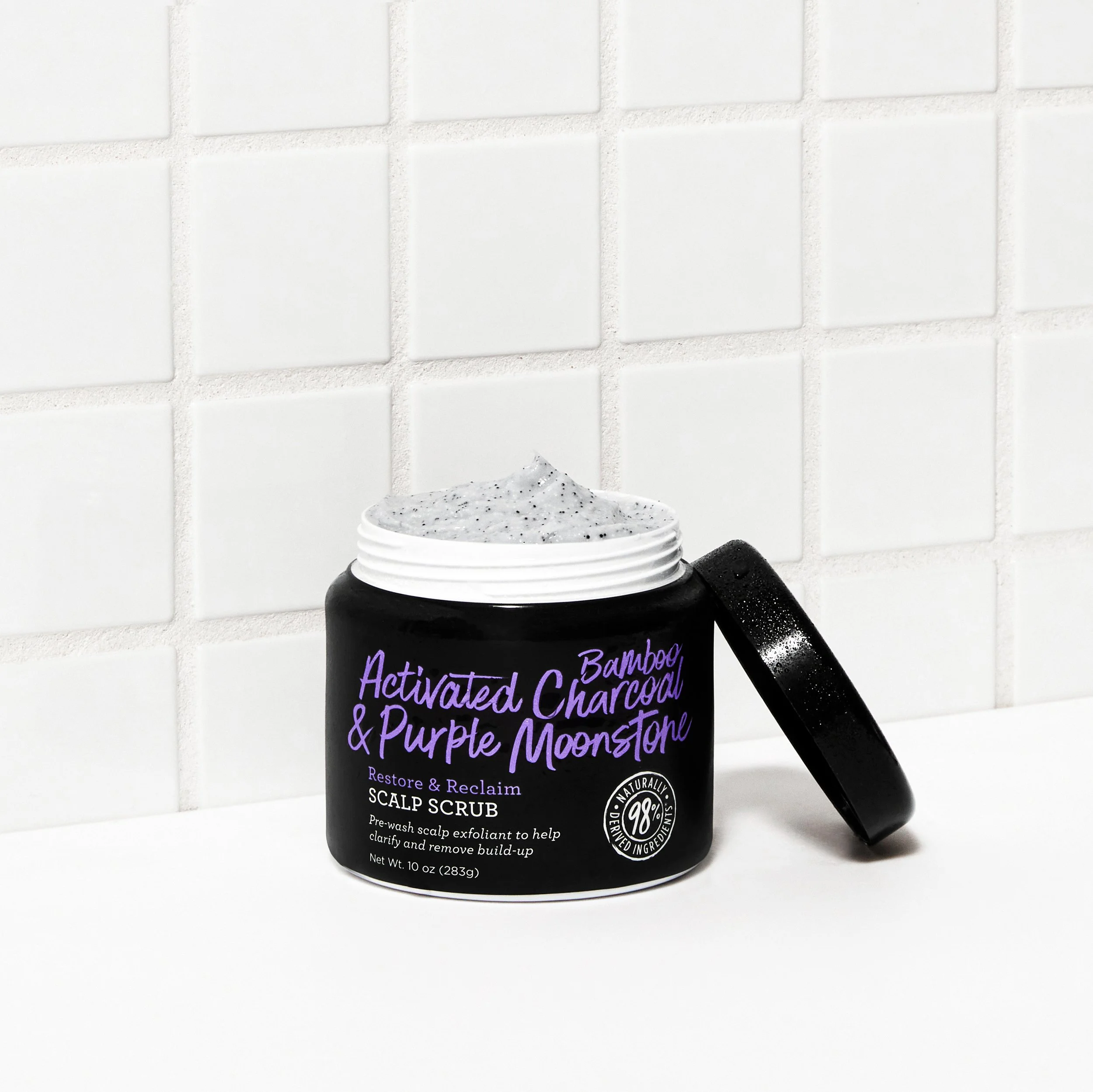 14028_NYMN_Naturals_NaturalsActivatedBambooCharcoal_PurpleMoonstoneScalpScrub_LifeStyleStillLife_018_Main.jpg