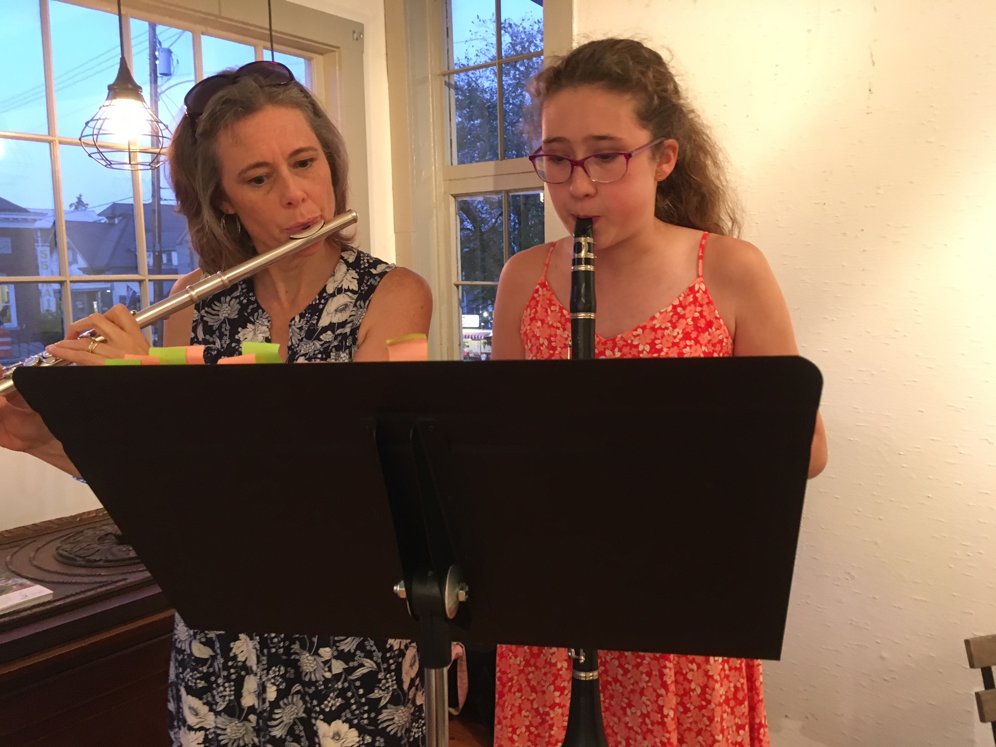 Lisa Truesdell on flute and daughter Julia on clarinet in the Weaving Project.