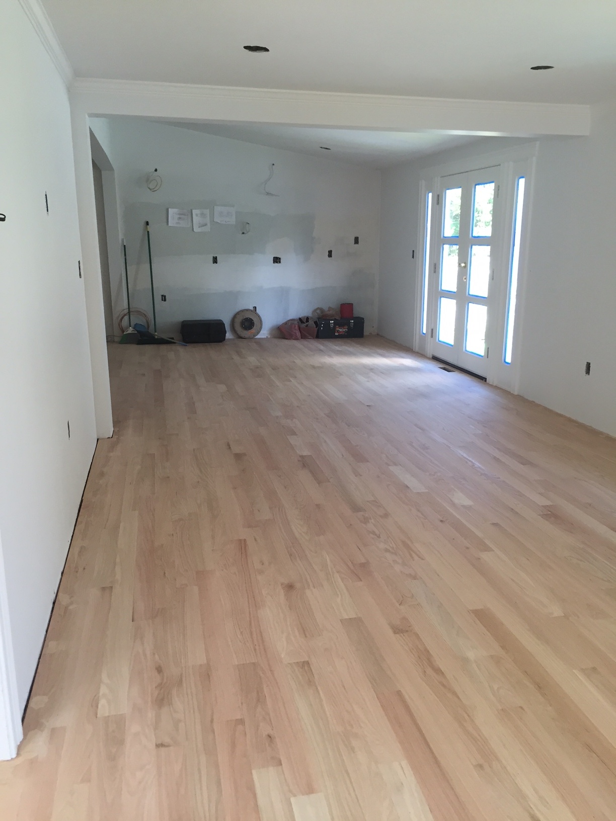 2 months later... French doors put in and new hardwood floors
