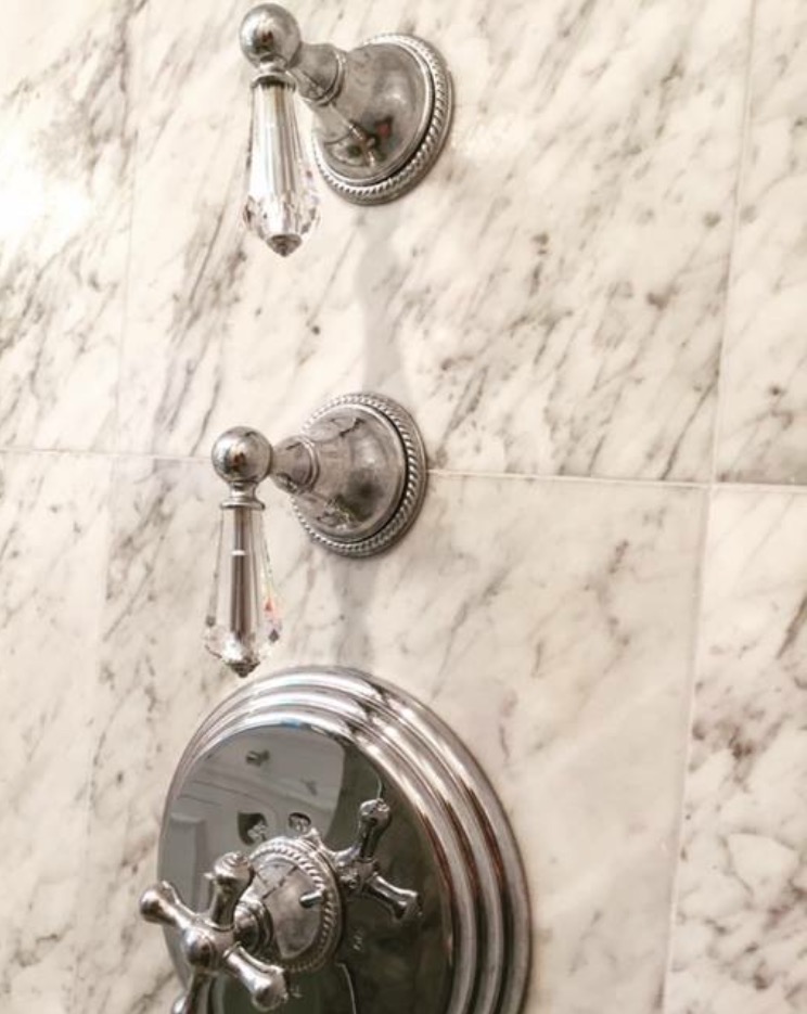 Crystal knobs against marble with chrome finish 