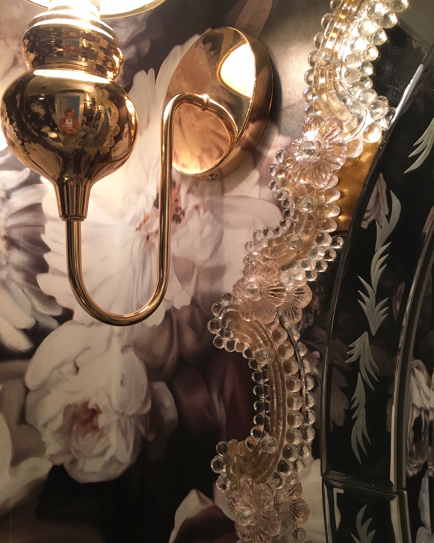 Vintage glass mirror and gold light fixtures. This is the one place I used gold because this room was meant to look over the top and ornate. 
