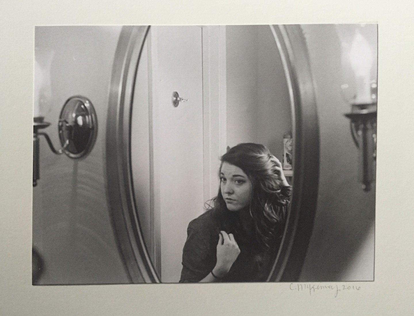 Jumping on the 2016 flashback trend and Film Friday at the same time! 

This self portrait was part of a collective photo III final project. It was shot on film (with a self timer), developed in the darkroom, printed on an enlarger with some dodging 