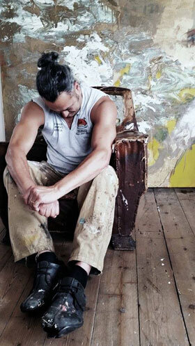 Kim Wan in front of his painting in the studioPhoto credit: ©Annie Morris