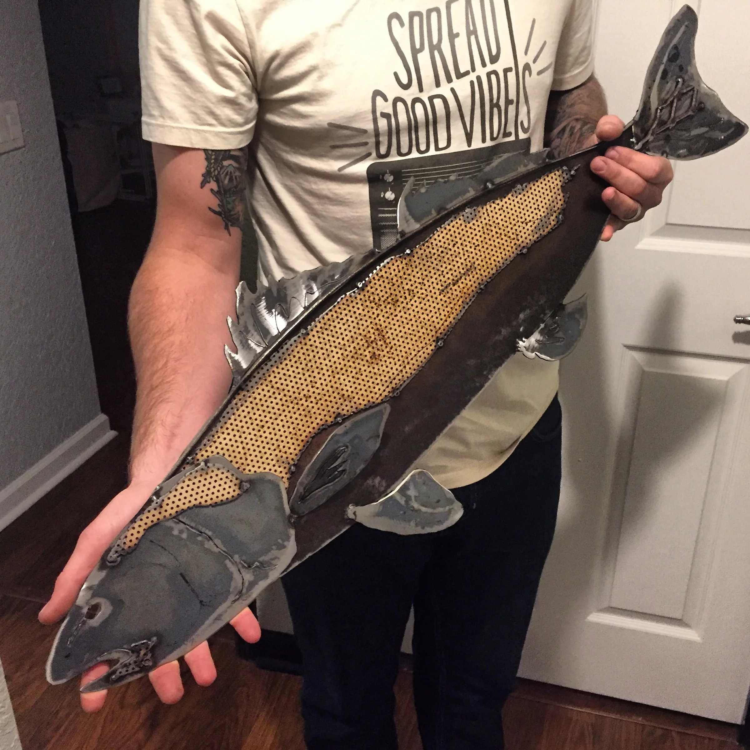 holding red fish.jpg
