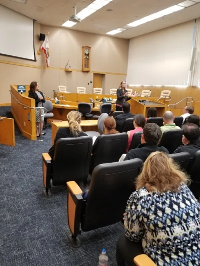Christina Cramer and Carol Allen discuss the Salary Resolution with SCAMC members