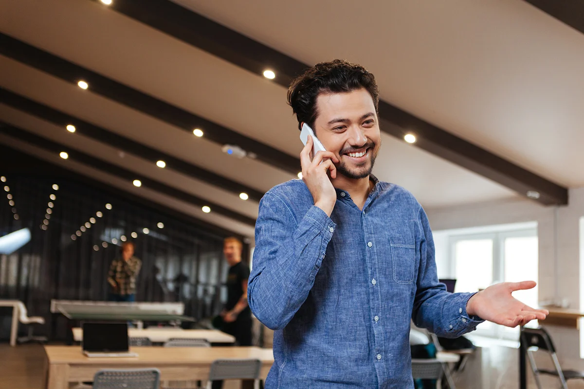 photodune-15918923-man-talking-on-the-phone-in-office-lsm.jpg