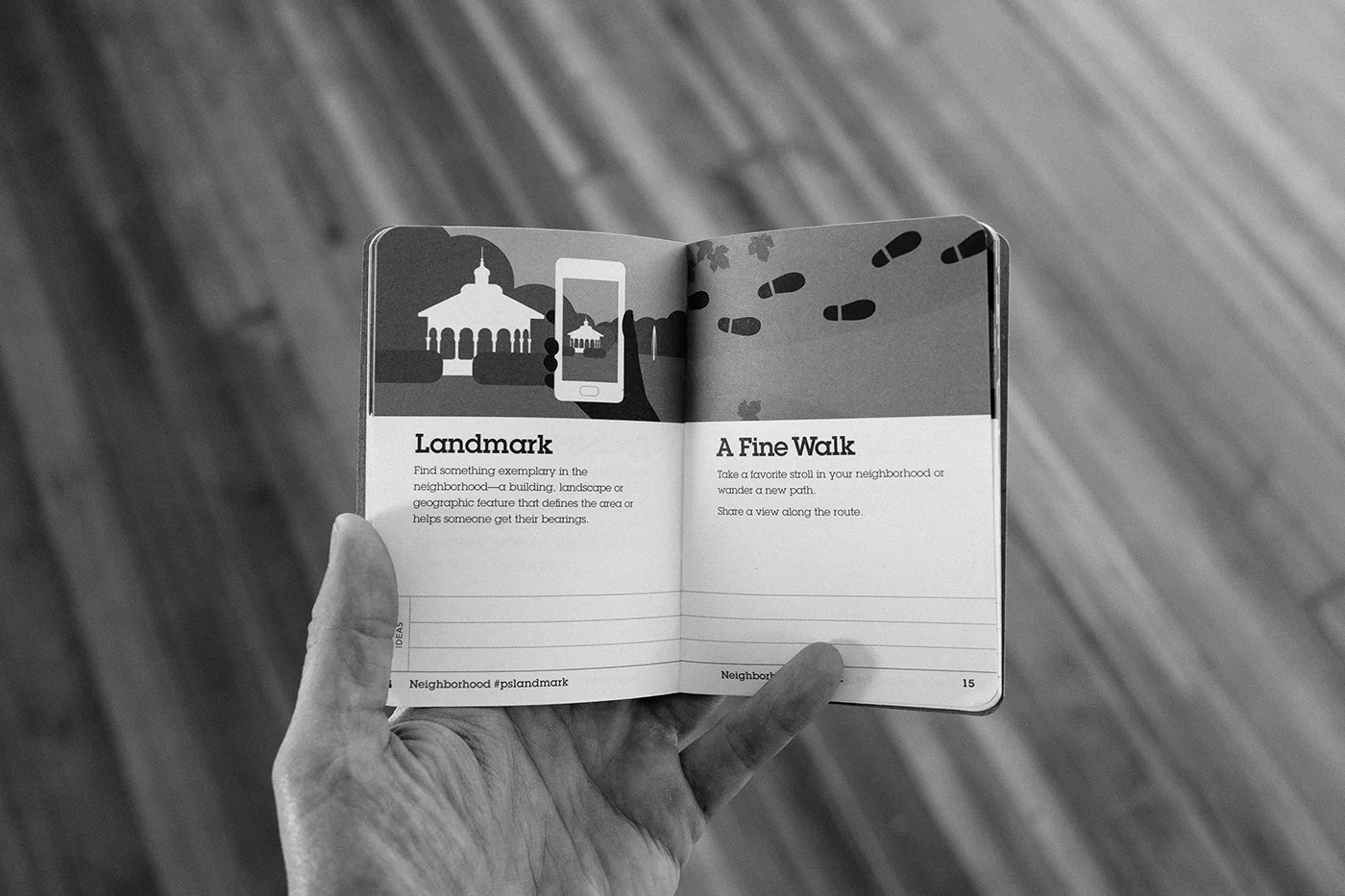 Interior spread of the PhotoScouting Guidebook. Two tasks in the neighborhood section encourage participants to photograph a landmark and a favorite walk.Photo by Chris Glass