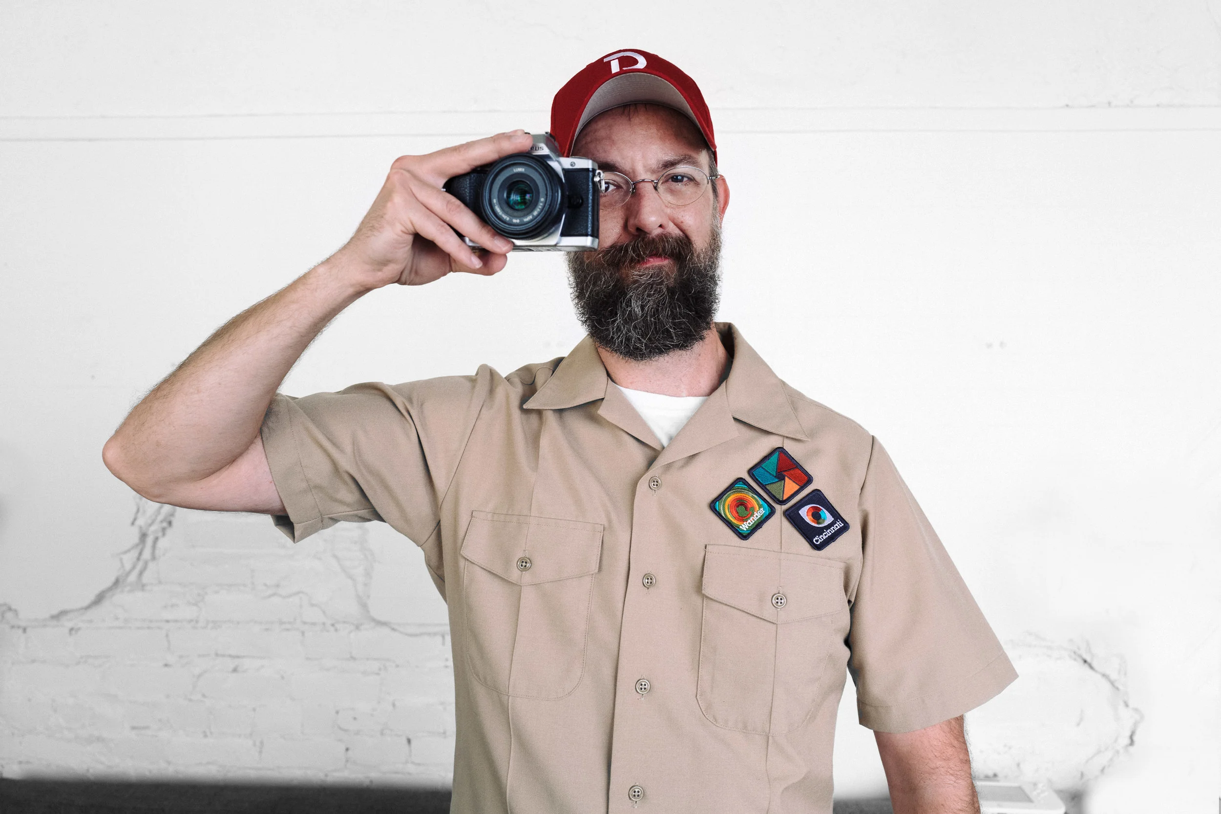 Chris Glass wearing the badges of PhotoScouting. Photo by Joe Mesa