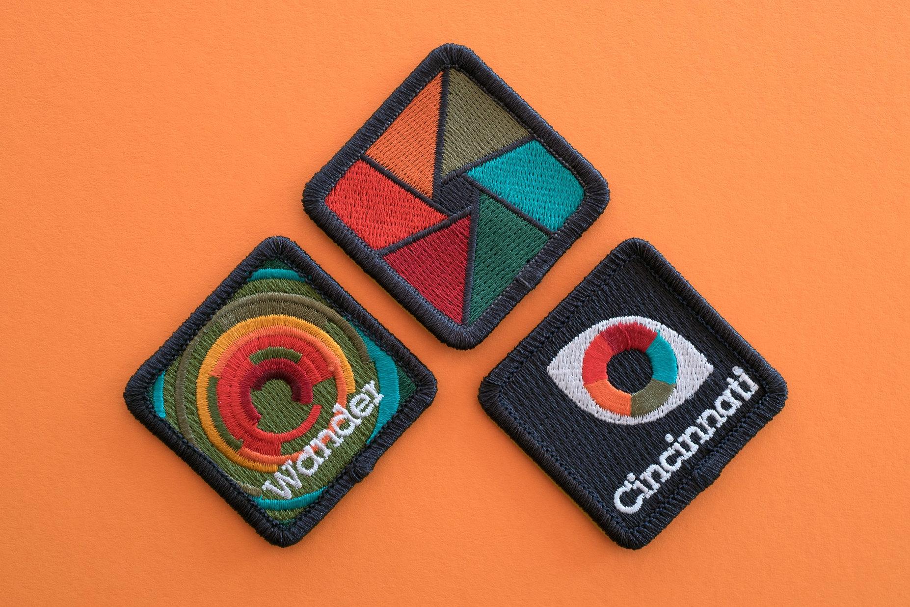 Participants earn patches for each of the major categories: Photography, Neighborhood and People. Design & Photo by Chris Glass