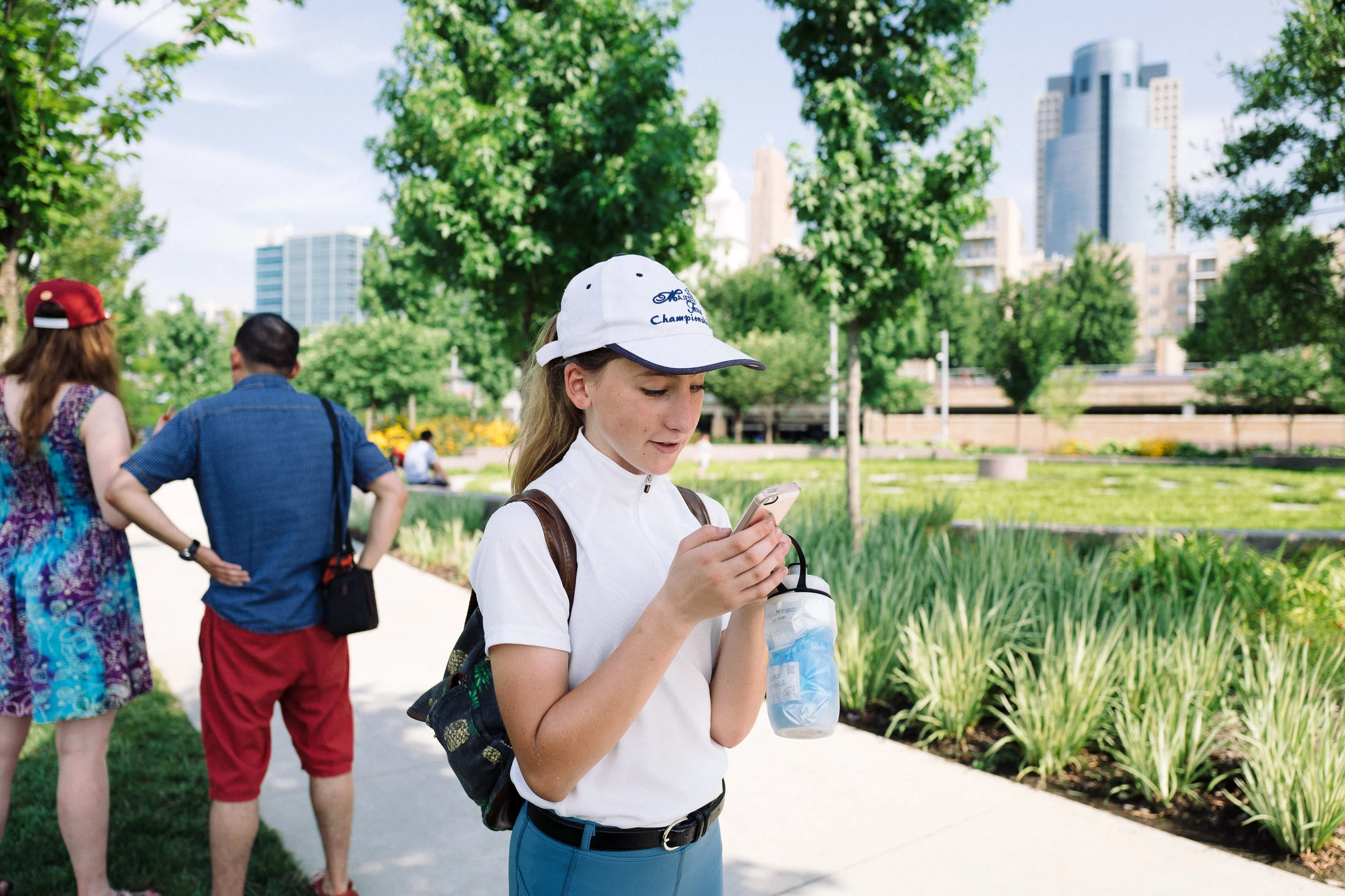 Neko Duvall takes a photo with her mobile phone during a Photowalk along Smale Riverfront Park