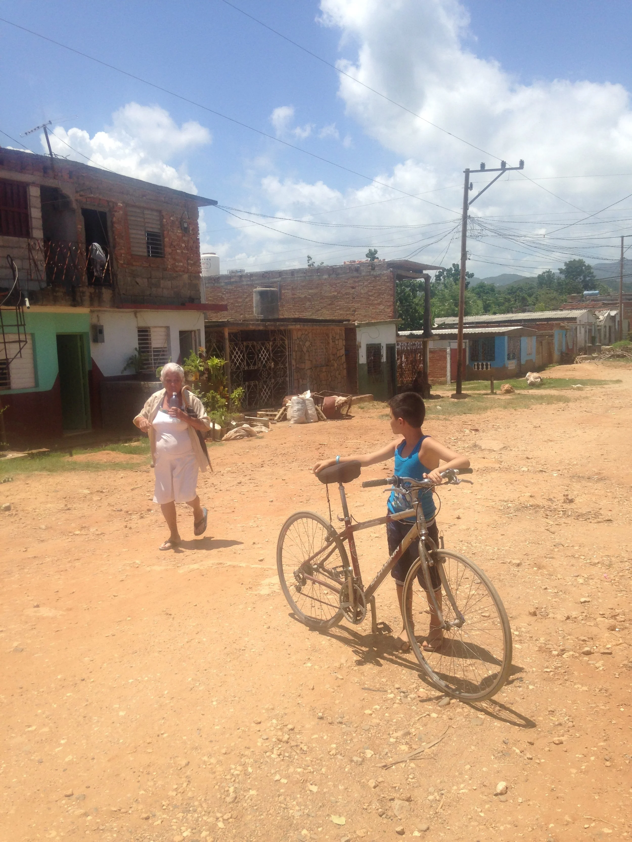 Trinidad Kid on bike.JPG