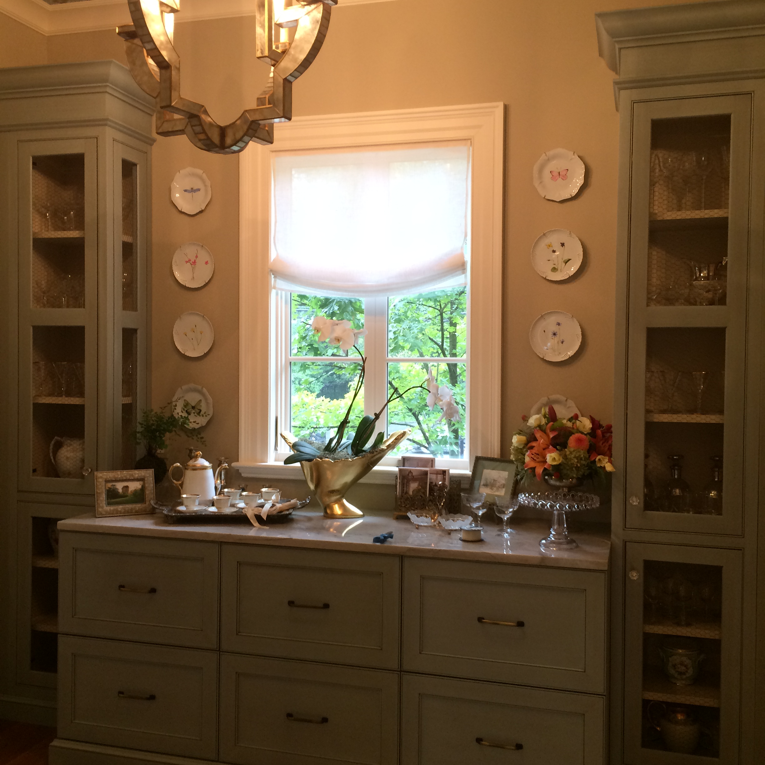 Cabinets and counter top with a glimpse at Aidan Design's truly amazing lighting.
