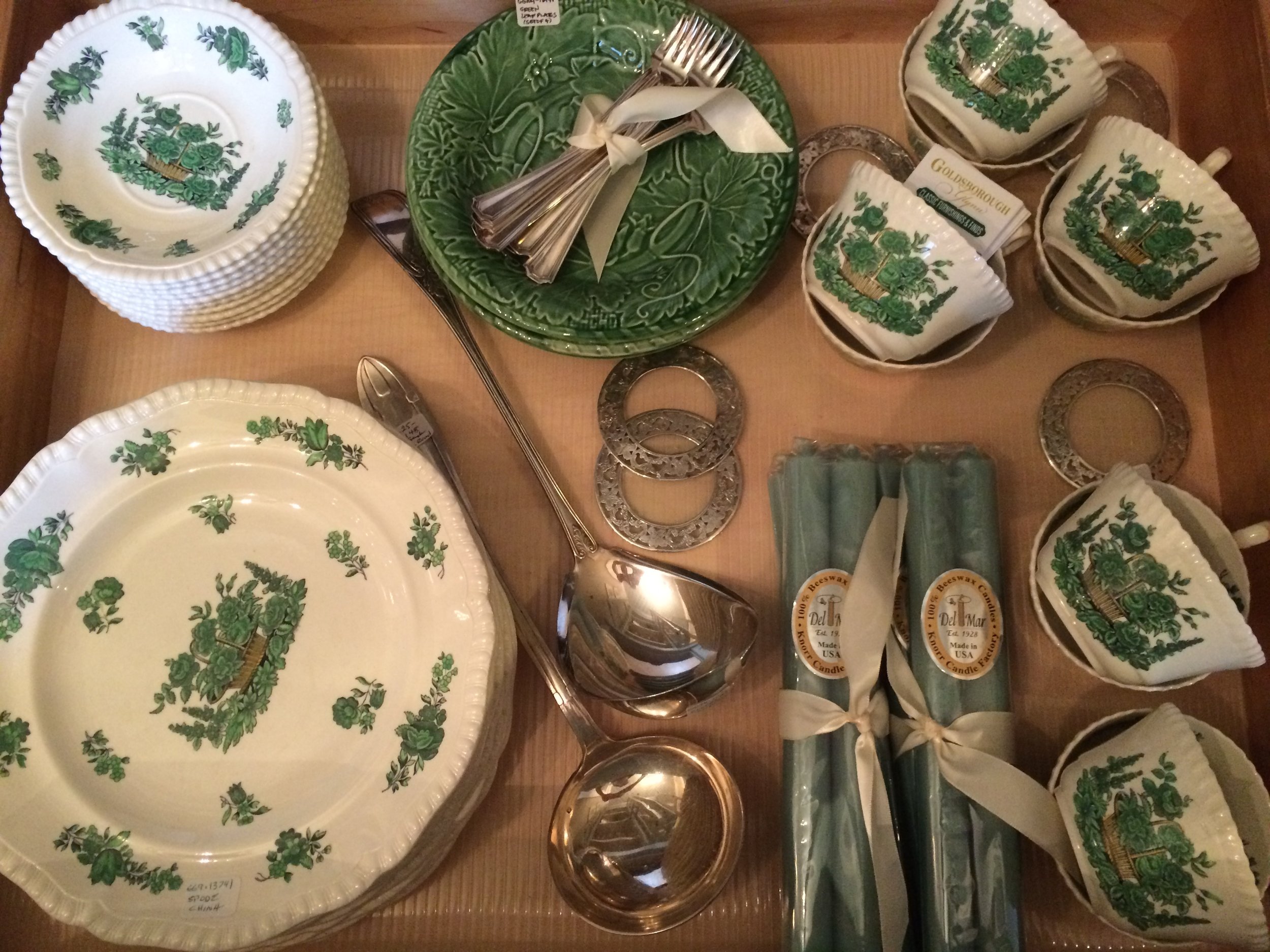 A drawer full of Spode china, various silver-plate items and Del-Mar 100% bees wax candles.