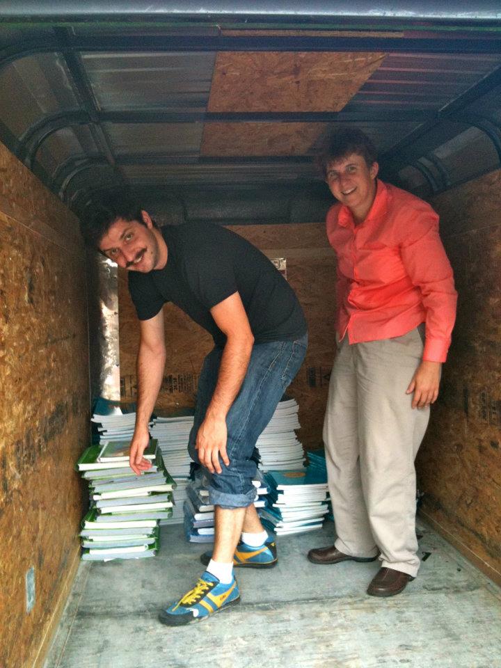 ARTIST CORPS Alum Zack Feinberg and Education Director Dr. BETH HAYES load up music curricula for distribution to new orleans music teachers. special thanks to the revivalists for use of the band's trailer ON that hot august day! (2011)