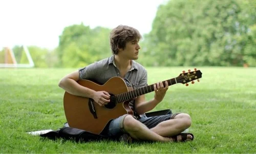 Guy on Landis Green Still Playing Wonderwall