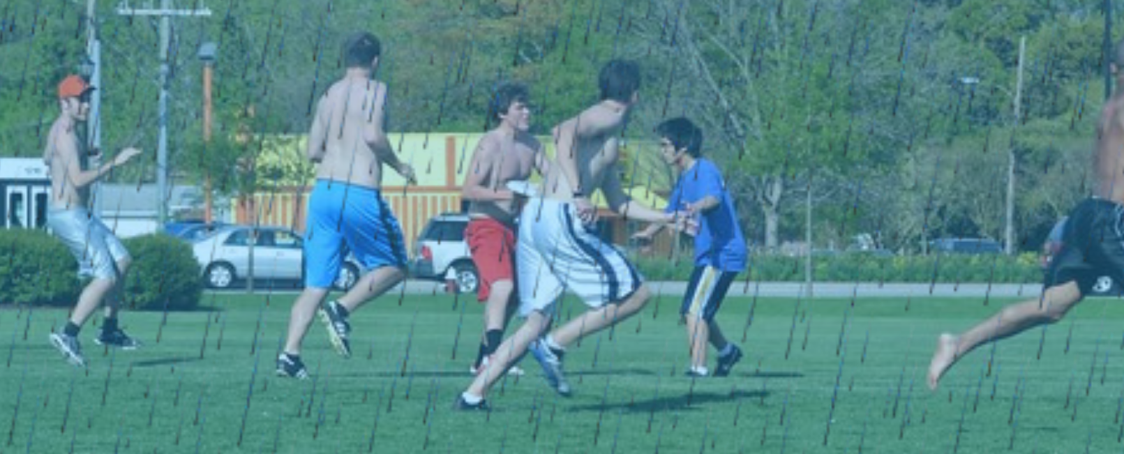 Frisbee Boys Still Out There in the Rain, Playing Frisbee