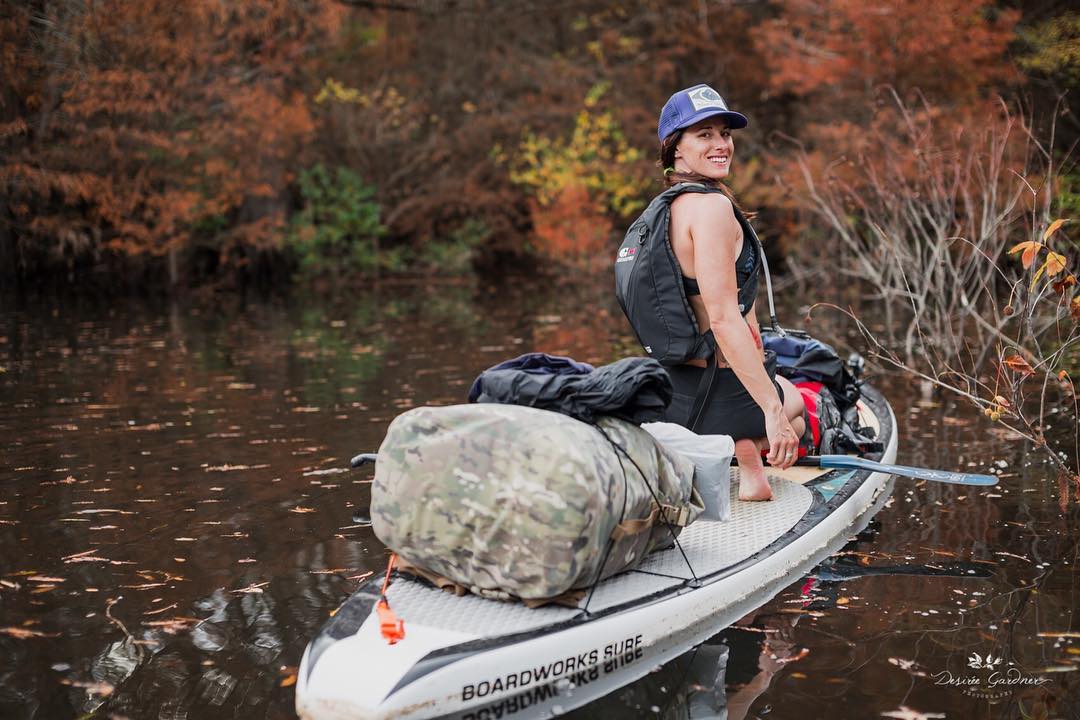 Jessica Cichra paddleboard camping