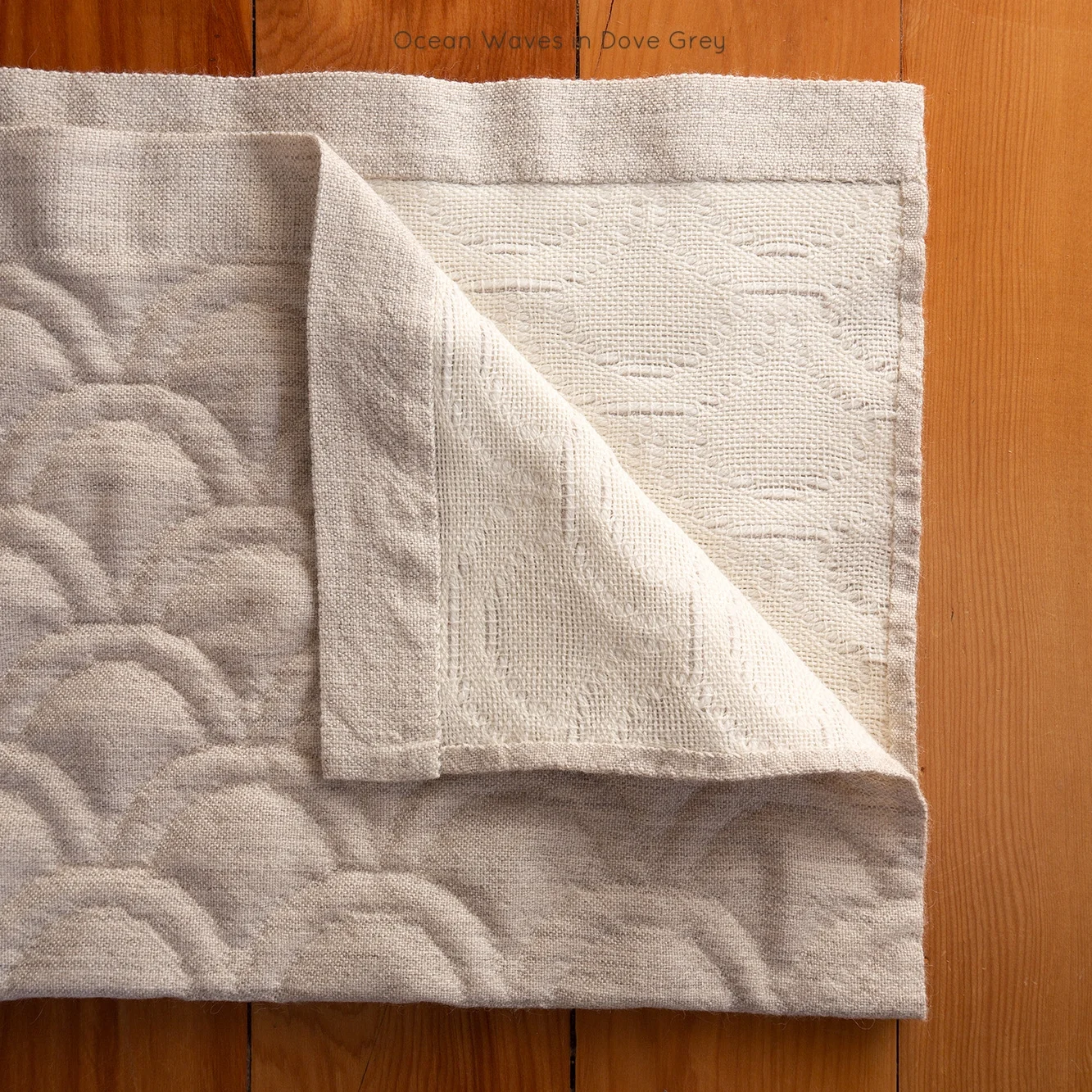 Niche_Textiles_Baby_Blanket-23 Dove waves hem back.jpg