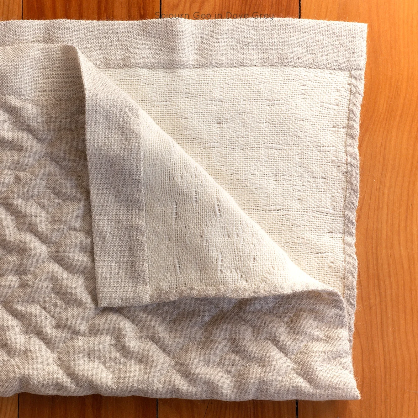 Niche_Textiles_Baby_Blanket-21 Dove geo hem back.jpg