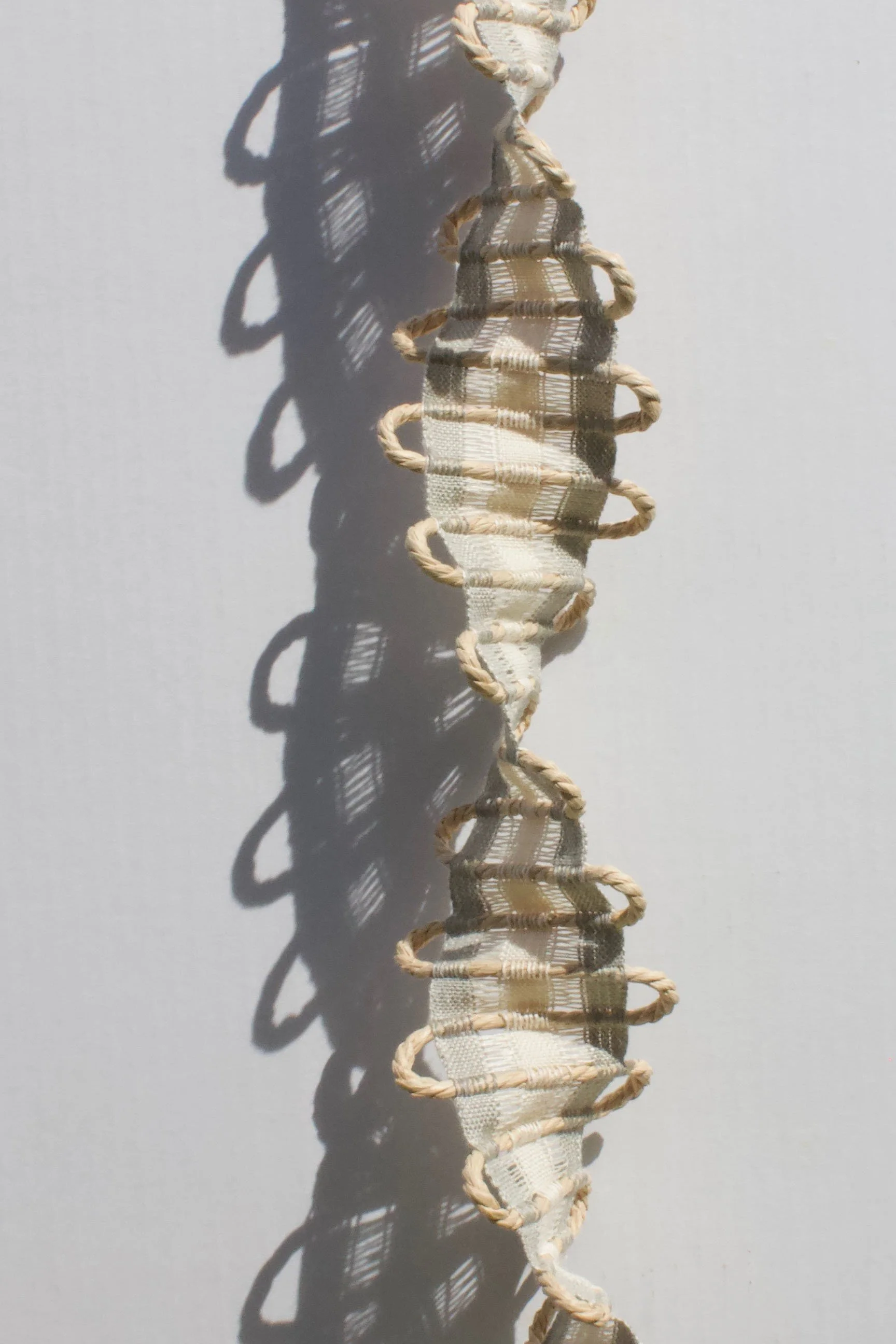 Loom woven spiral form