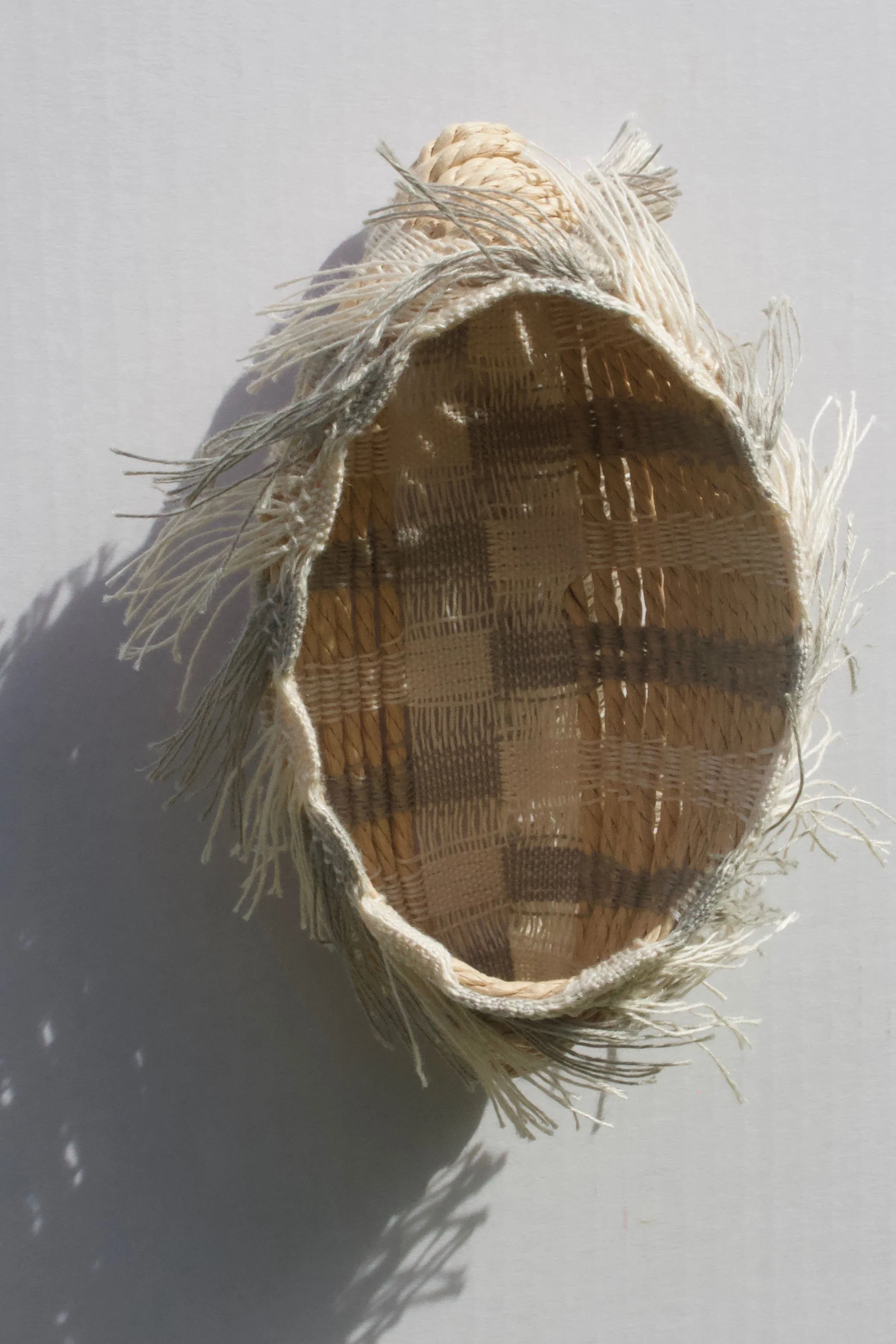 Loom woven closed basket form