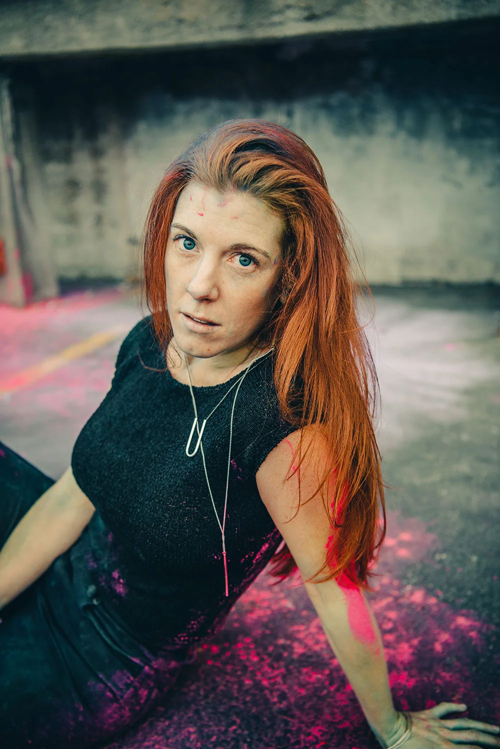 Model wearing U turn necklace