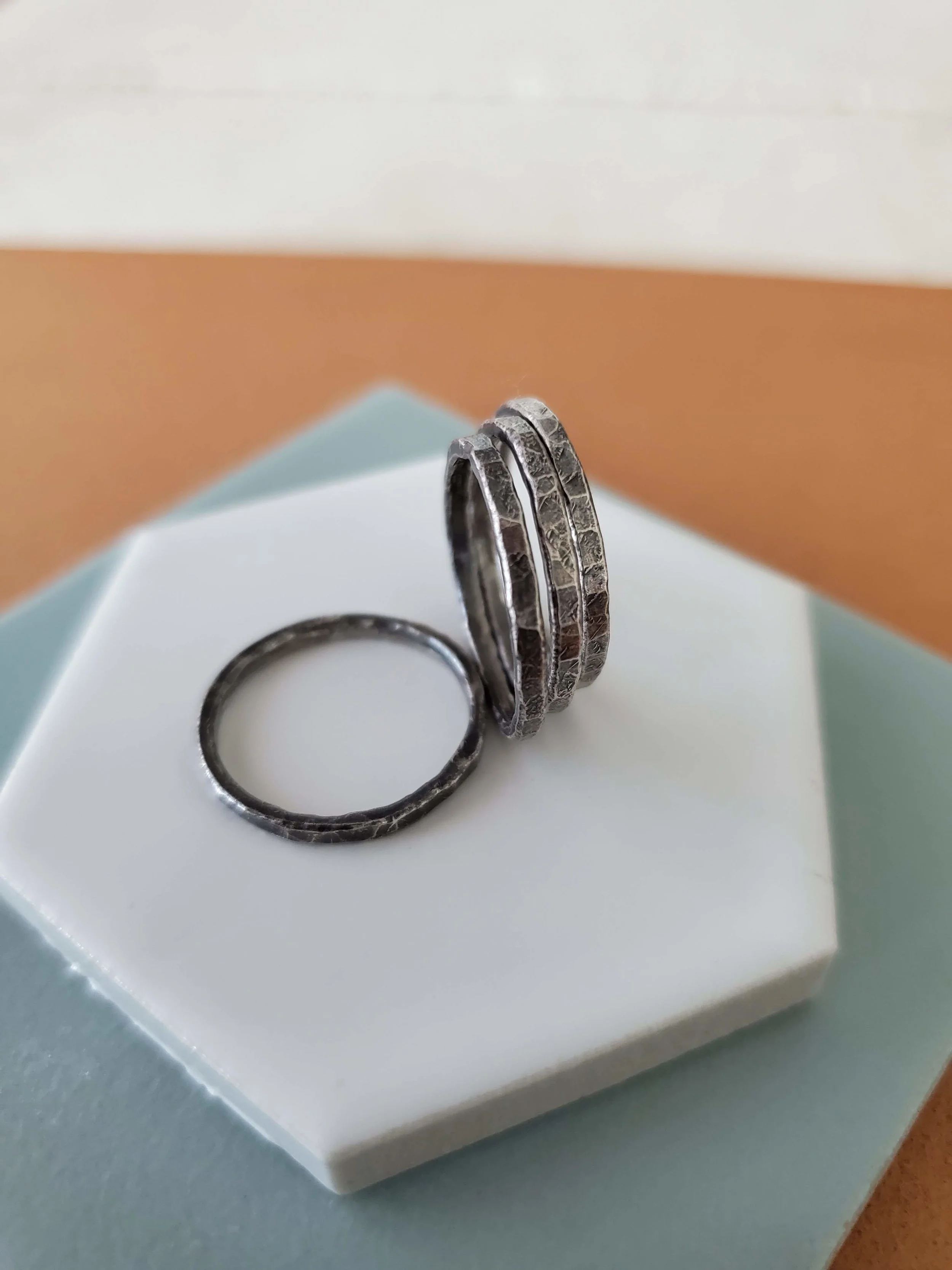 organic black silver stacking rings