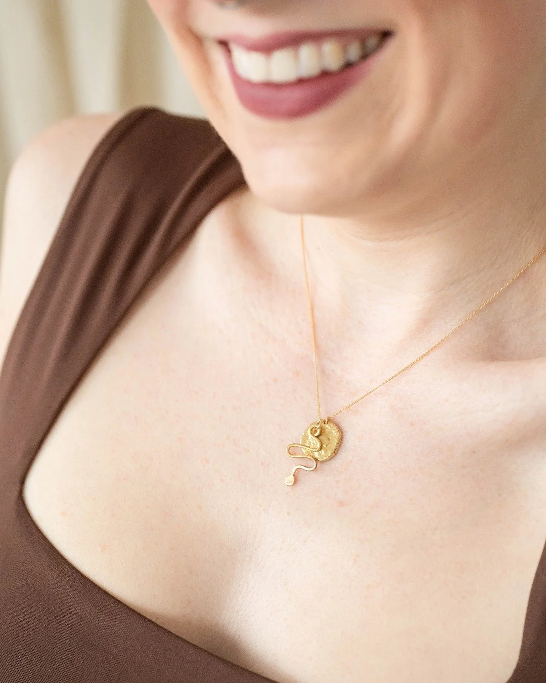 For my in person shows last year I made these really cute Roman Coin necklaces and added tiny snakes to them. I finally uploaded them to the website for you :) Available in sterling silver or brass, 16 or 18 inches, I hand fabricate each little snake