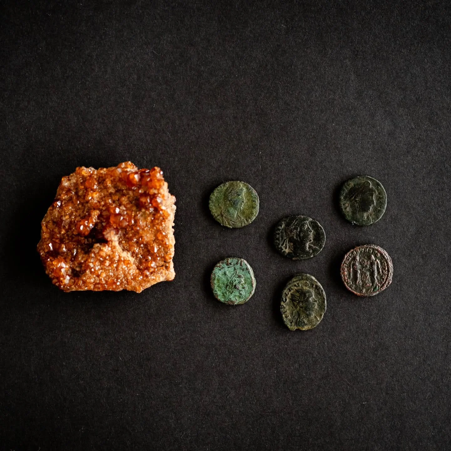 The day I found these coins still feels like a movie. I was traveling through Europe, and randmomly came across a flea market. Picture it: tables overflowing with chaotic beauty, faded watercolor paintings stacked next to chipped ceramic goods, dusty