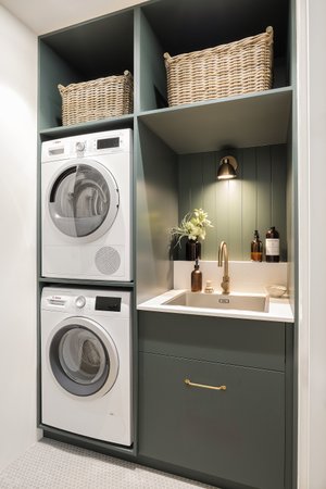 Laundry in a cupboard — Adore Home Magazine