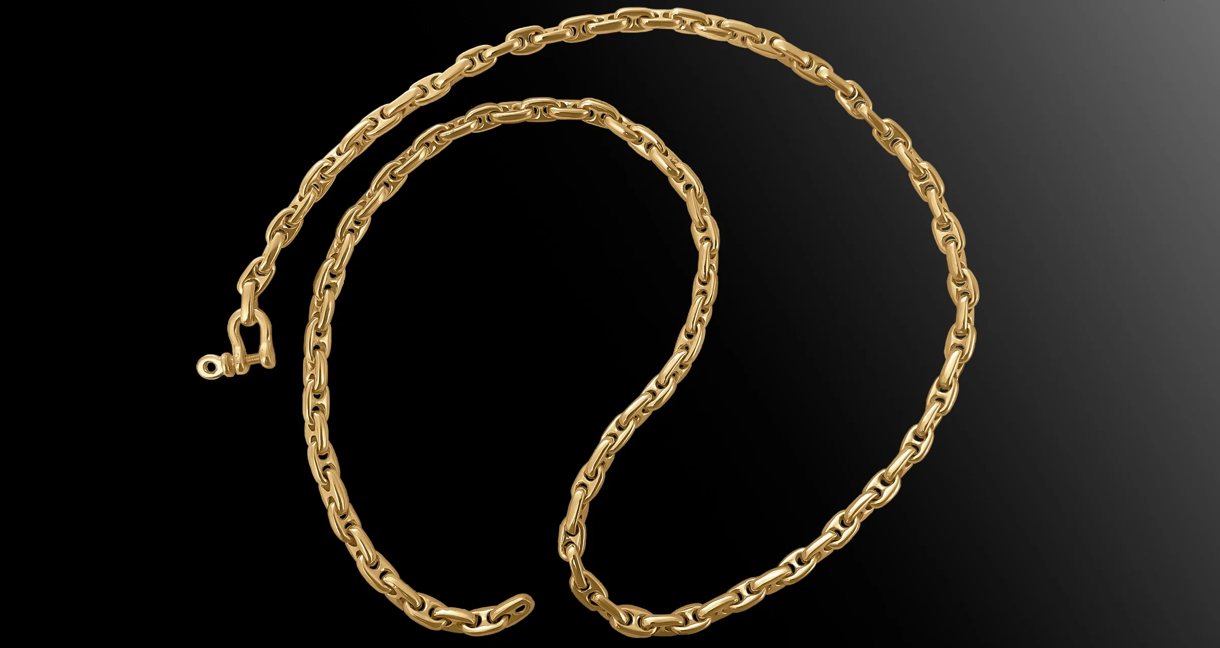 Gold anchor chain necklace with a shackle and pin clasp, designed by hand for seafarers.