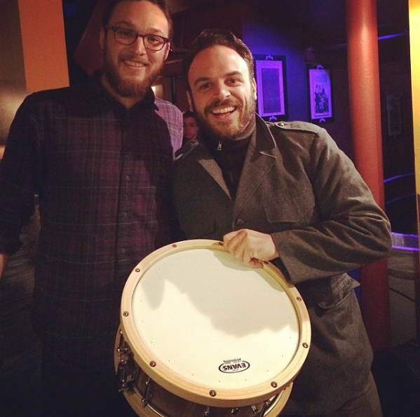Michael Calabrese of Lake Street Drive , receiving a custom Diamond Drum Co at Bluebird Theater. 