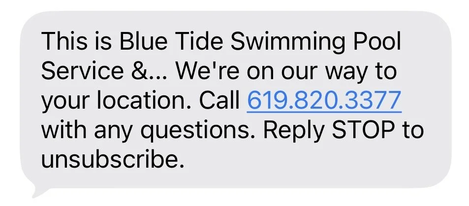 Text message stating that Blue Tide Swimming Pool Service is en route to your location, with a contact number 619.820.3377. "On the way" text message option offered by blue tide swimming pool service.