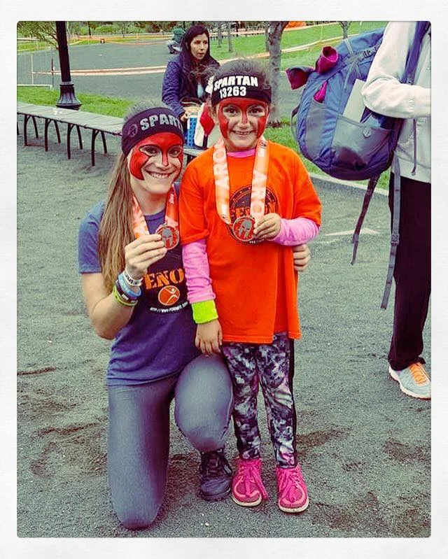 Spartan Race Brand Ambassador Katie Purcell and her "Mini-Me" Theresa.