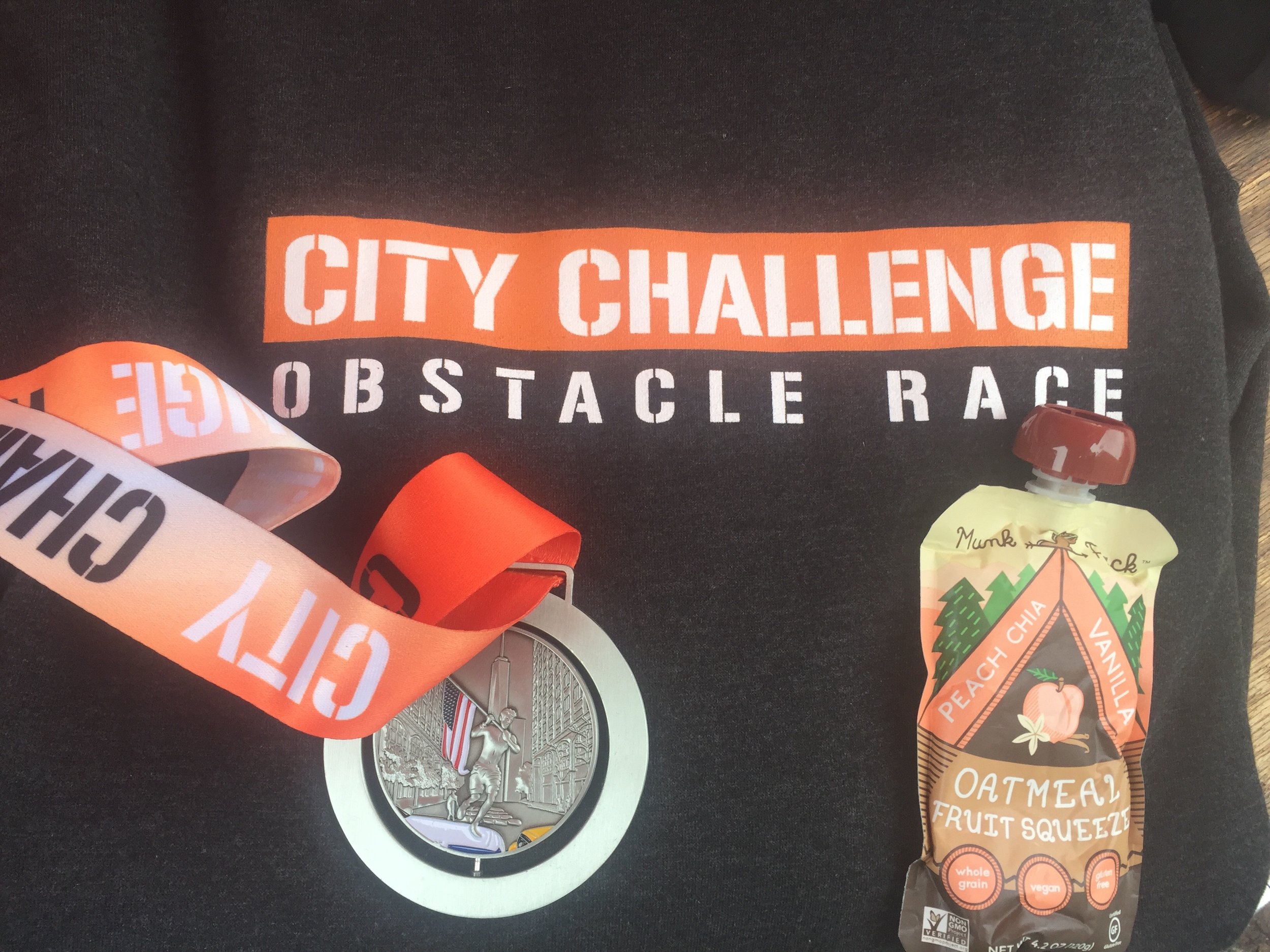 A sweater, a MunkPack and the City Challenge Race Finisher medal.
