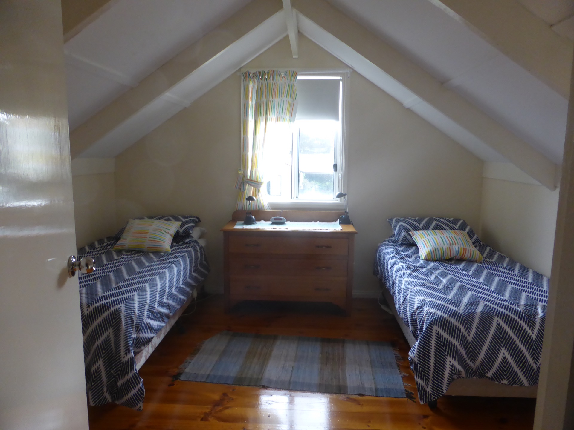 Attic bedroom for kids, tucked away from the oldies